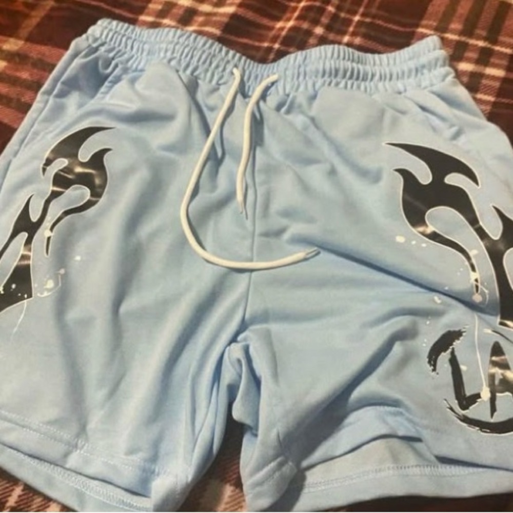 NFINITY Light Blue Men's Athletic Shorts with Black Graphic